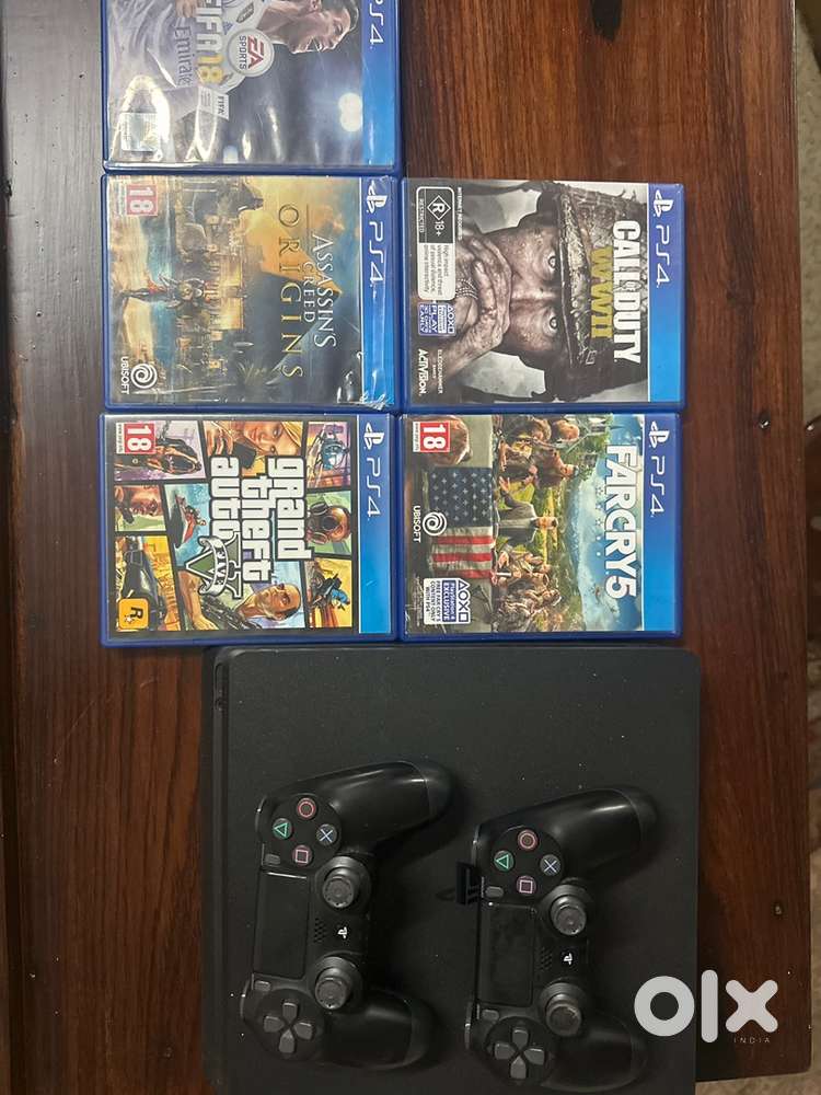 Ps4 slim +5 games +2 controllers