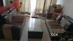 7 seater L shape sofa with center table glass top