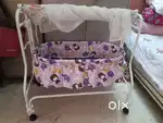 Babyhug cradle with mosquito net