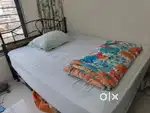 Bed with side table