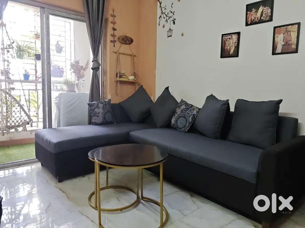 L pattern sofa with center table