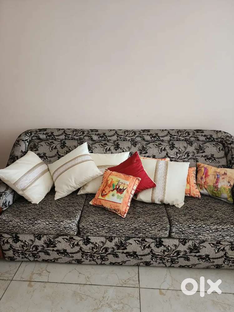 Three seater  sofa and one center table