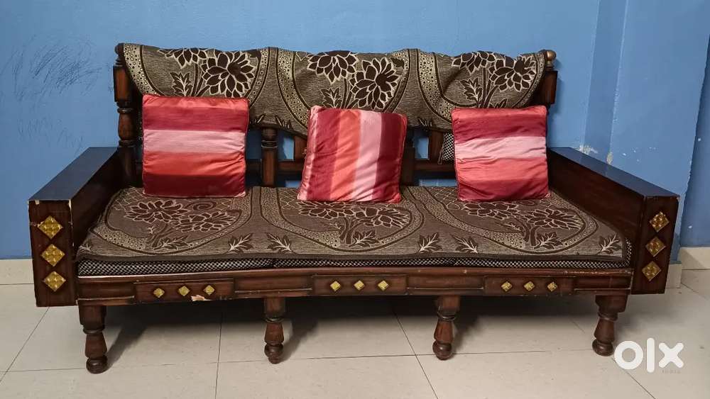 Wooden Sofa Set with Cushions. 
Solid wood frame
Condition: Good