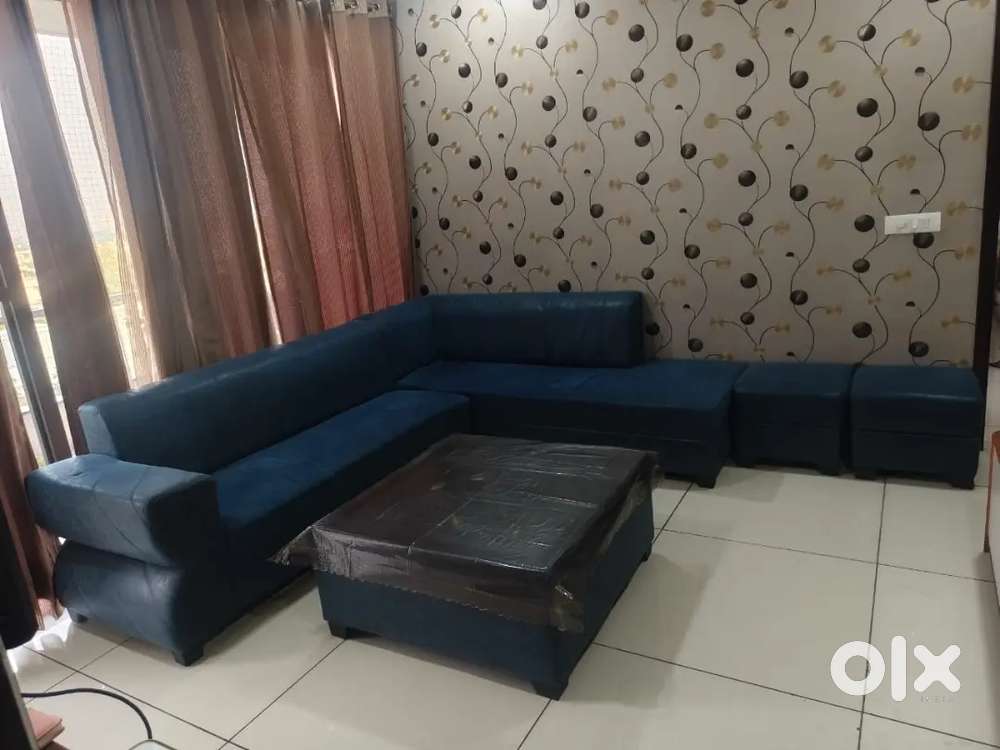 L shape sofa with 2 stools and 1 table