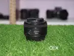 Canon 50mm 1.8 stm price lense