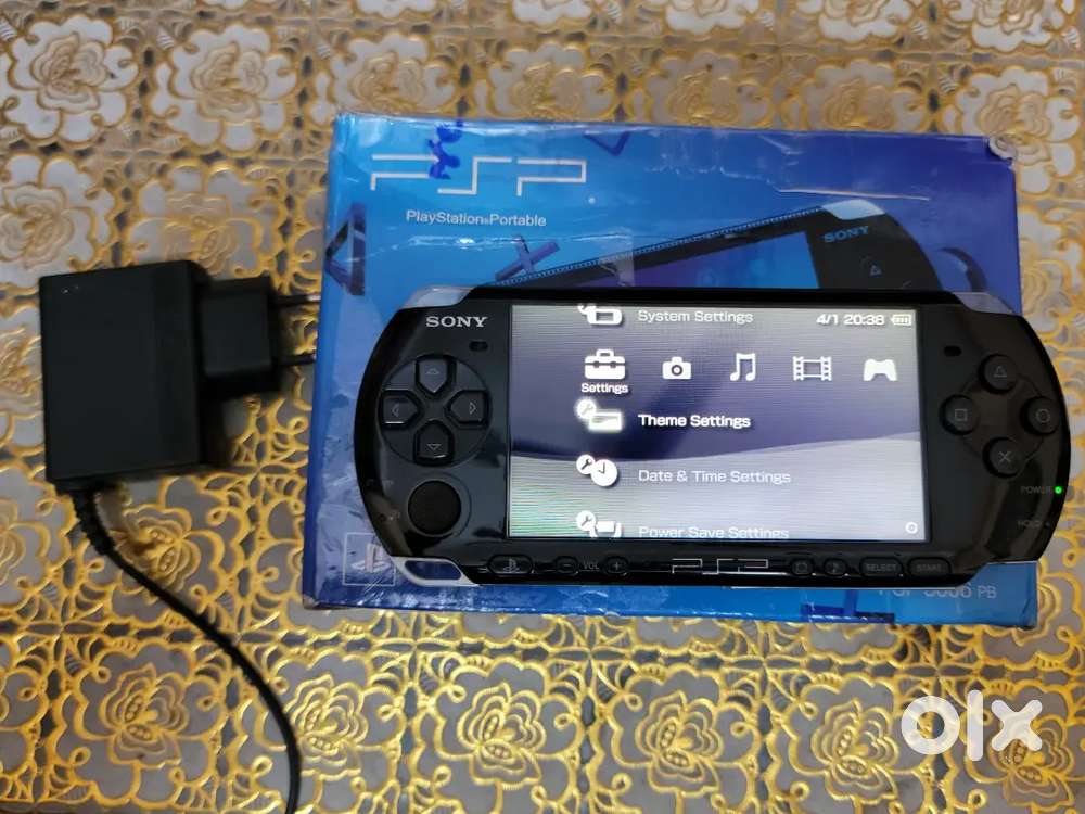 Sony PSP 3000 (Playstation portable) with box, games & charger