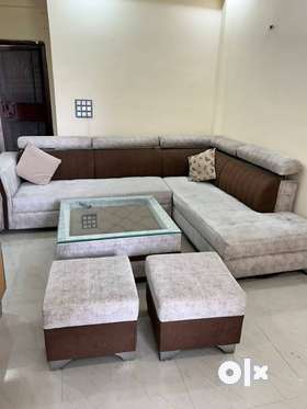 7 seater sofa set with center table & 2 puffy