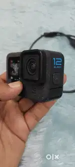 GoPro Hero 12 Black in mint condition with battery cable