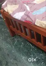 Single wooden bed (Less used) for sale