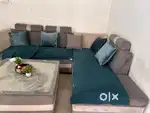 L type sofa with centre table and 2 puff