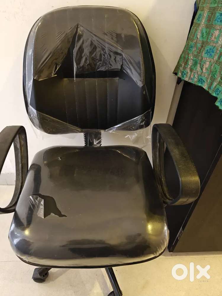 Chair brand new with plastics