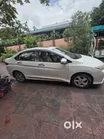 I am selling my Honda city car white color vx top model