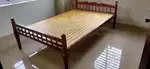 Double wooden cot