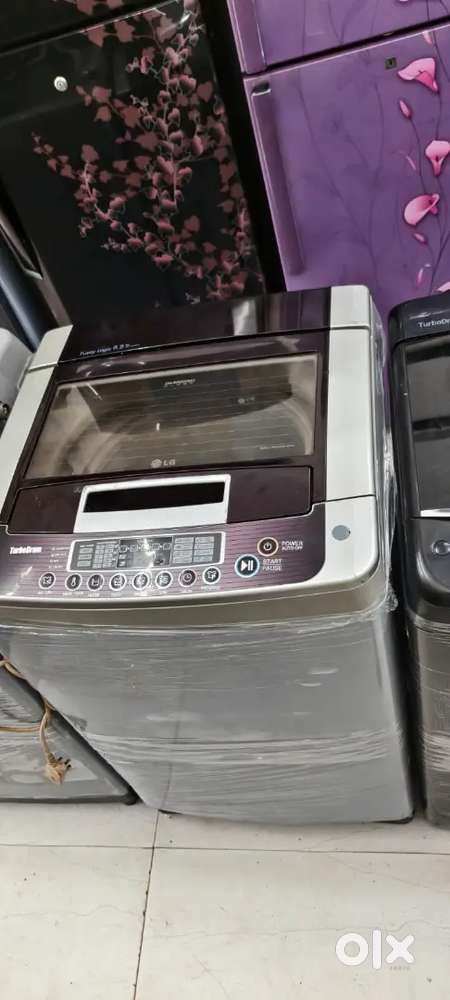 LG washing machine fully automatic top load with warranty 1 year old
