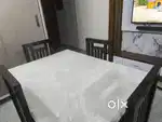 4 seater marble top dining table