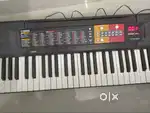 Yamaha psr f51 for sale with original adapter