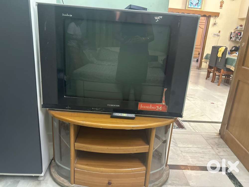 Videocon tv with table also
