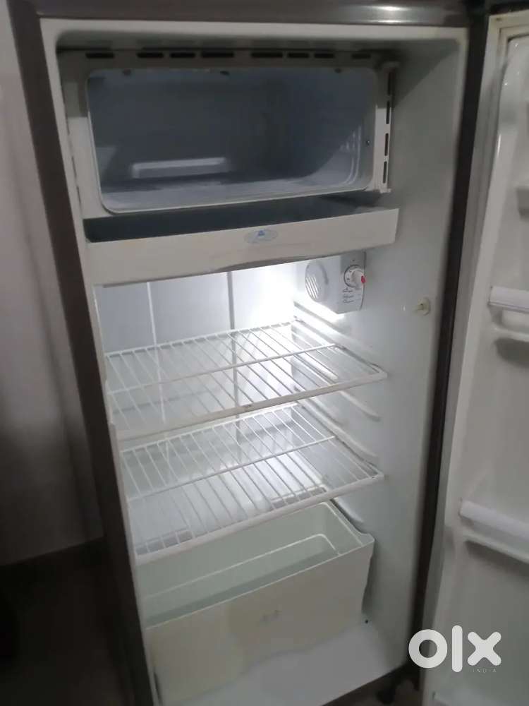 Refrigerator with Very good condition_ urgent selling