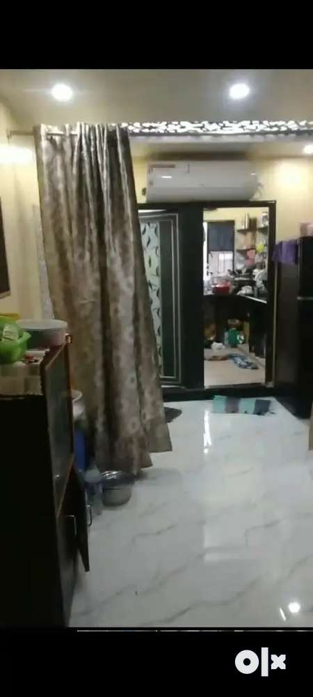 2bhk ready to move semi furnished flat in an apartment.
