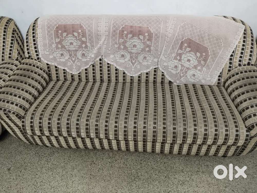 Sofa good condition and  wooden cot