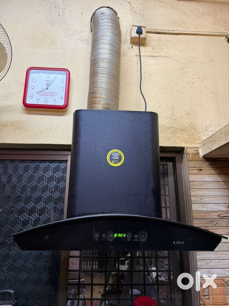 Elica 60 cm 1200 m3/hr Auto Clean Chimney Black colour
