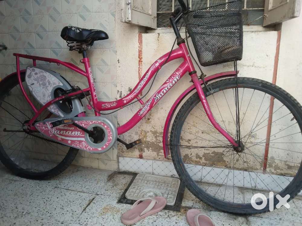 Girls running bycycle