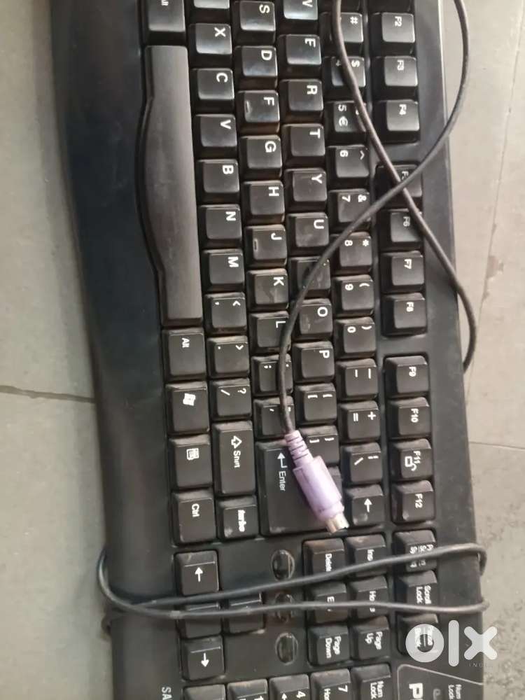 A wired keyboard with ps/2 connector old model and old connection type