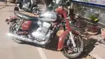 Red jawa classic petrol bike standard with helmet