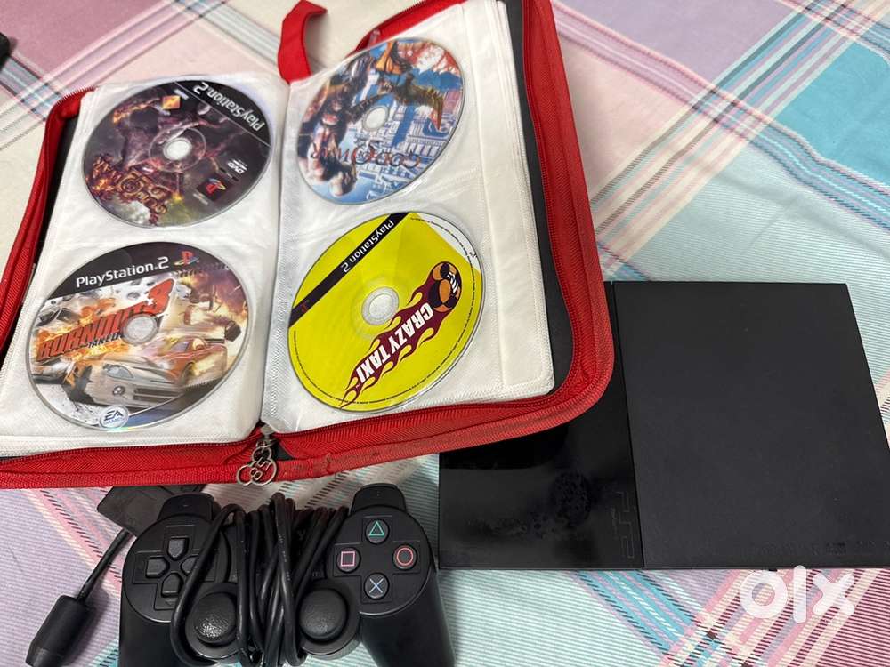 Sony playstation2 original with game cds and one gaming console
