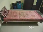 Single wooden bed and bed with mattress