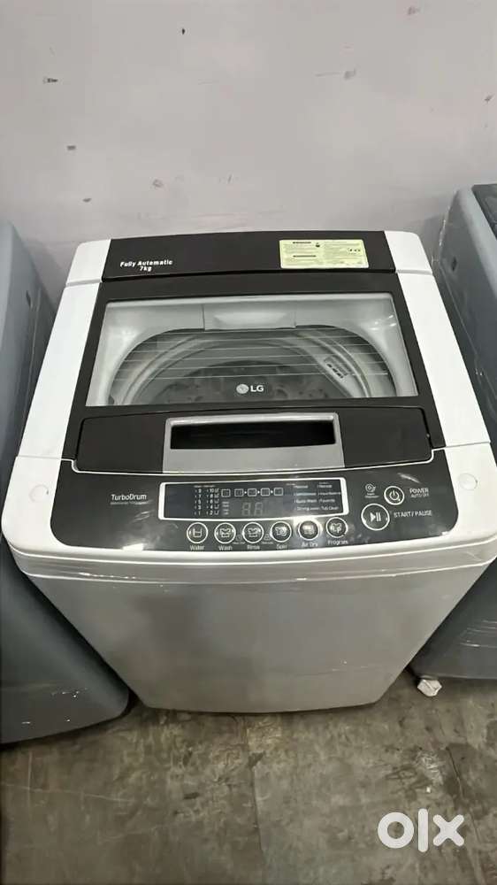 LG washing machine fully automatic top load with warranty 1 year old