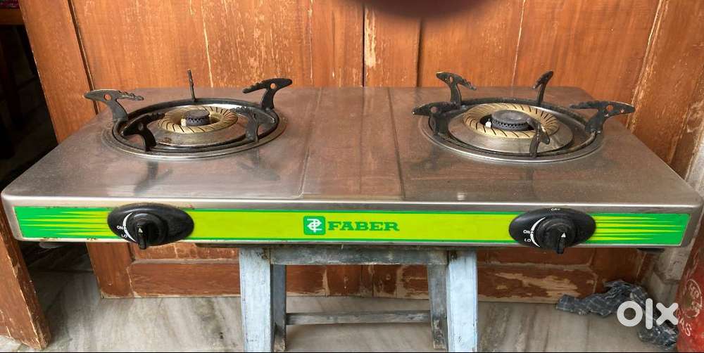 Sparingly used sleek/contemporary FABER stove (1 large/1 small burner)