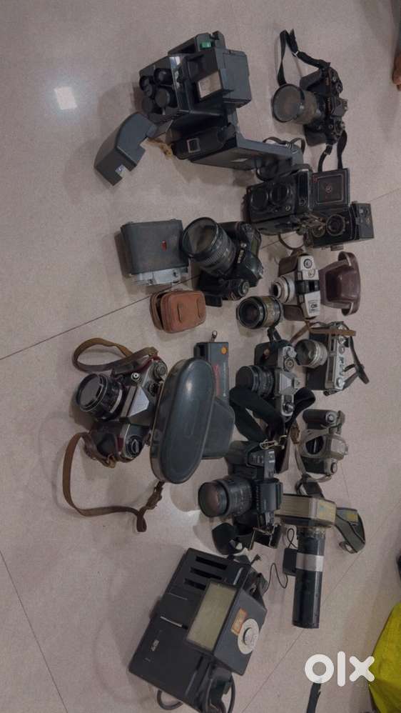 Collection of vintage and antique cameras (non-functional)
