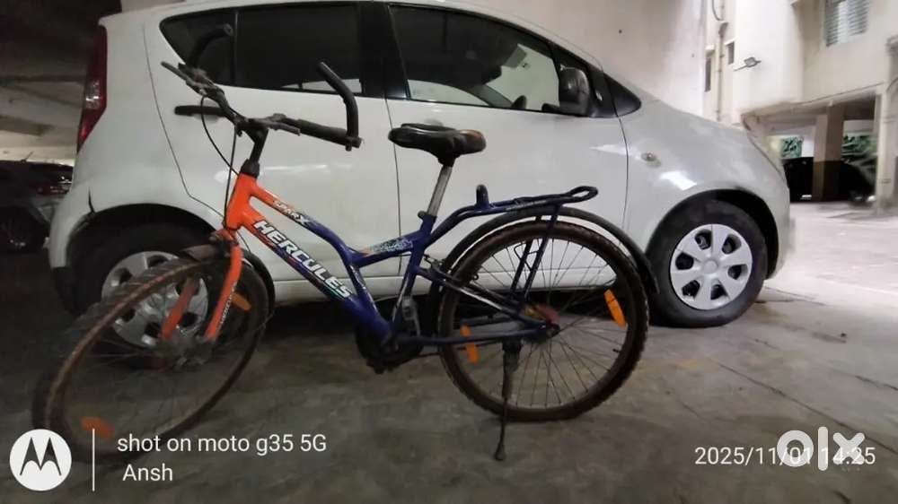 Hercules bicycle orange and blue colour proper working