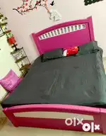 Queen size bed with PU finish and storage