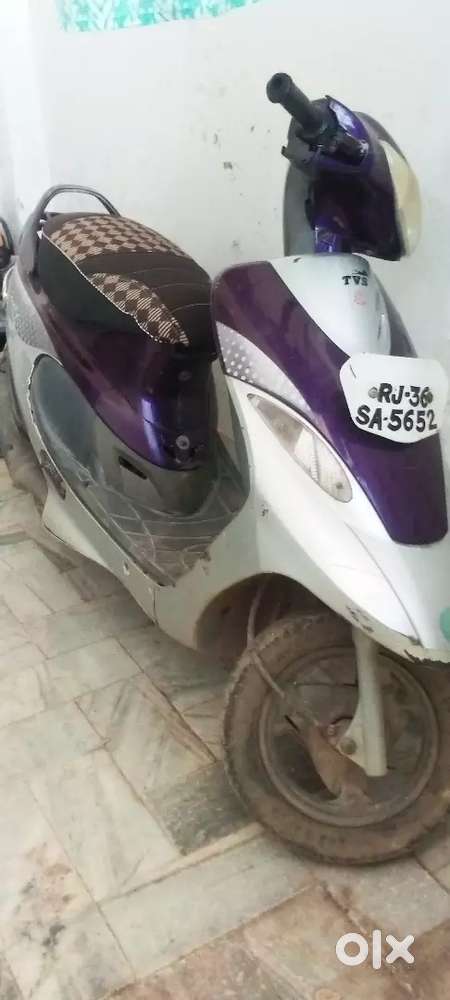Scooty pep plus purple colour minor scratches engine ok