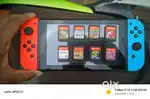 Nintendo Switch V2 + 9 Original Game Cartridges  Excellent Condition