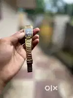 Titan gold watch