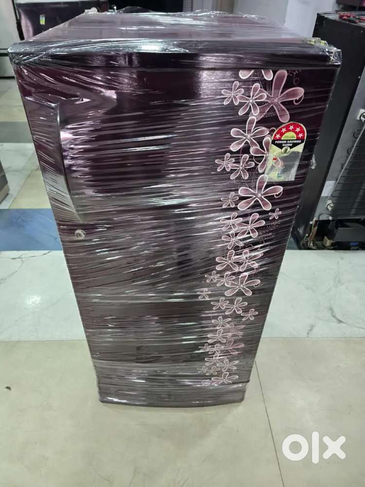 Kelvinator single door meroon colour flower design built in stablizer