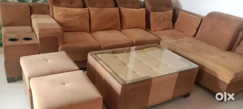 7 seater sofa with 2 puffs & one table