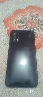Realme X7 (5G). With original box charger