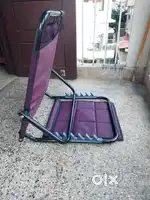 Bed rest with adjustable height