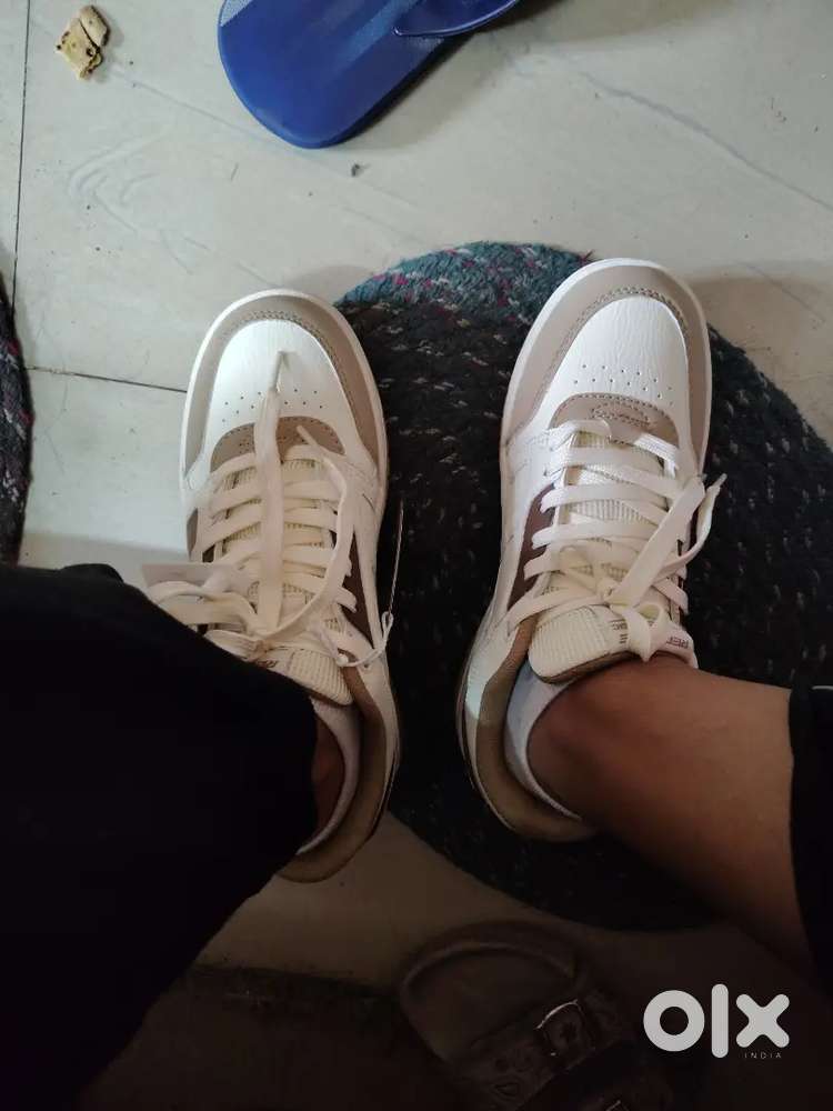 Red tape shoe for sale