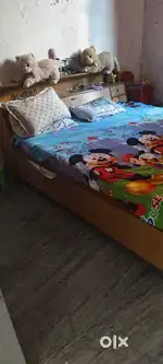 Homemade double bed with boxes, good condition, drawers at best price