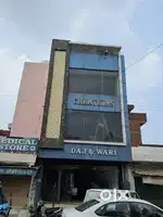Newly constructed 100 gaj commercial building  three storey on road