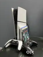 Ps5 Slim with 2 controllers and a game.