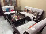 Teakwood 7 seater sofa with centre table for sale