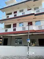 3-Floor Hostel Building Near Kakkanad – Prime Investment Property