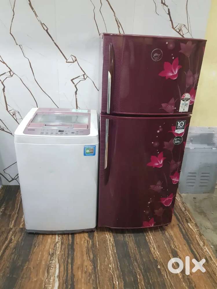 Godrej latest Double door refrigerator and LG top load washing machine