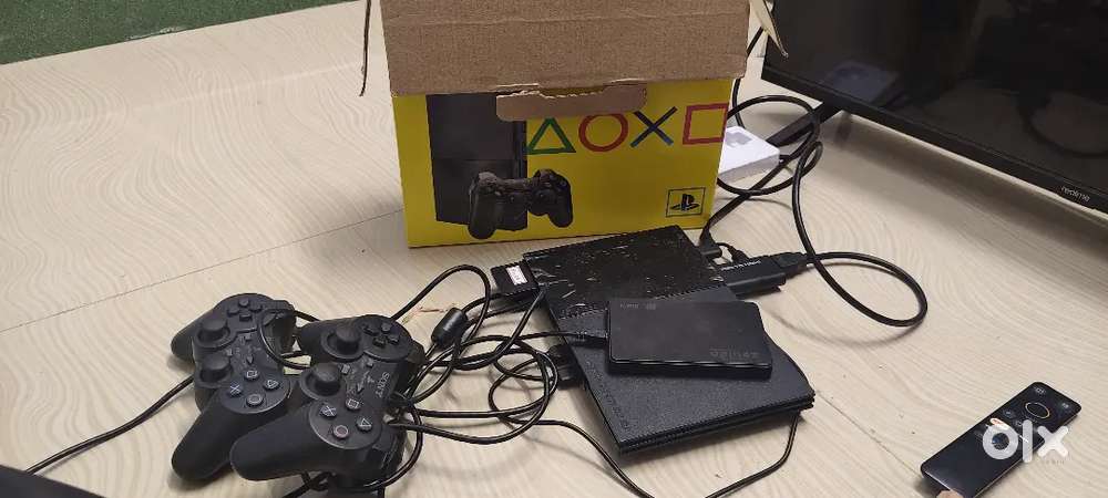 Sony play station refurbished. With 2 joystick and 150 games